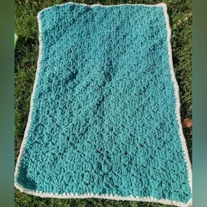 Handcrafted chunky crocheted blanket in sea green